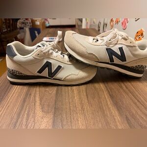 Women’s New Balance Beige and Black Sneakers